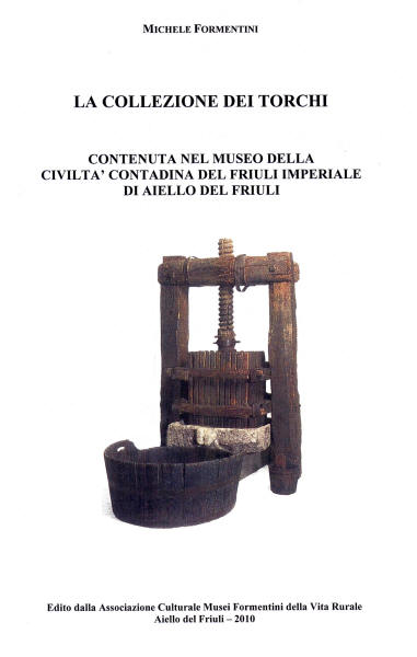 Copertina della pubblicazione "La collezione dei torchi contenuta nel Museo della Civilt Contadina del Friuli Imperiale" - Fotografia di un torchio del 1500 con base in pietra della contina Formentini